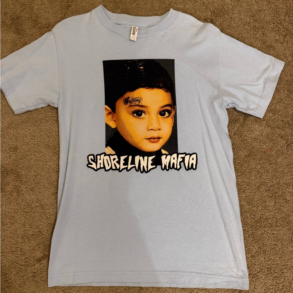 Shoreline Mafia Ohgeesy exclusive Light Blue Graphic Tee with Portrait Print